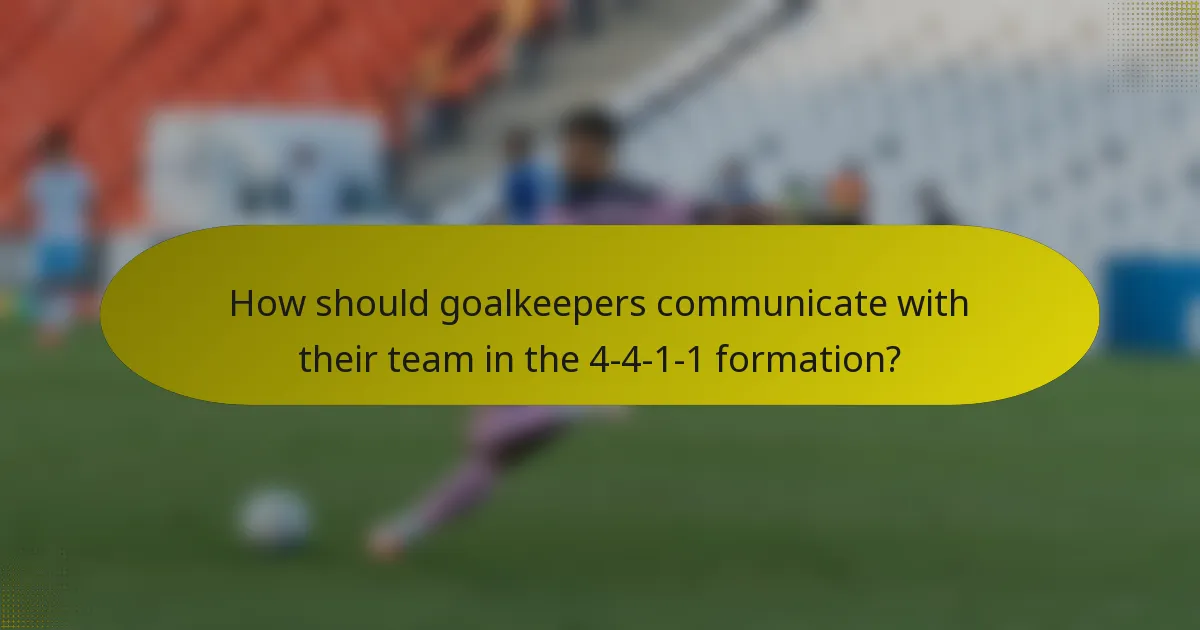 How should goalkeepers communicate with their team in the 4-4-1-1 formation?